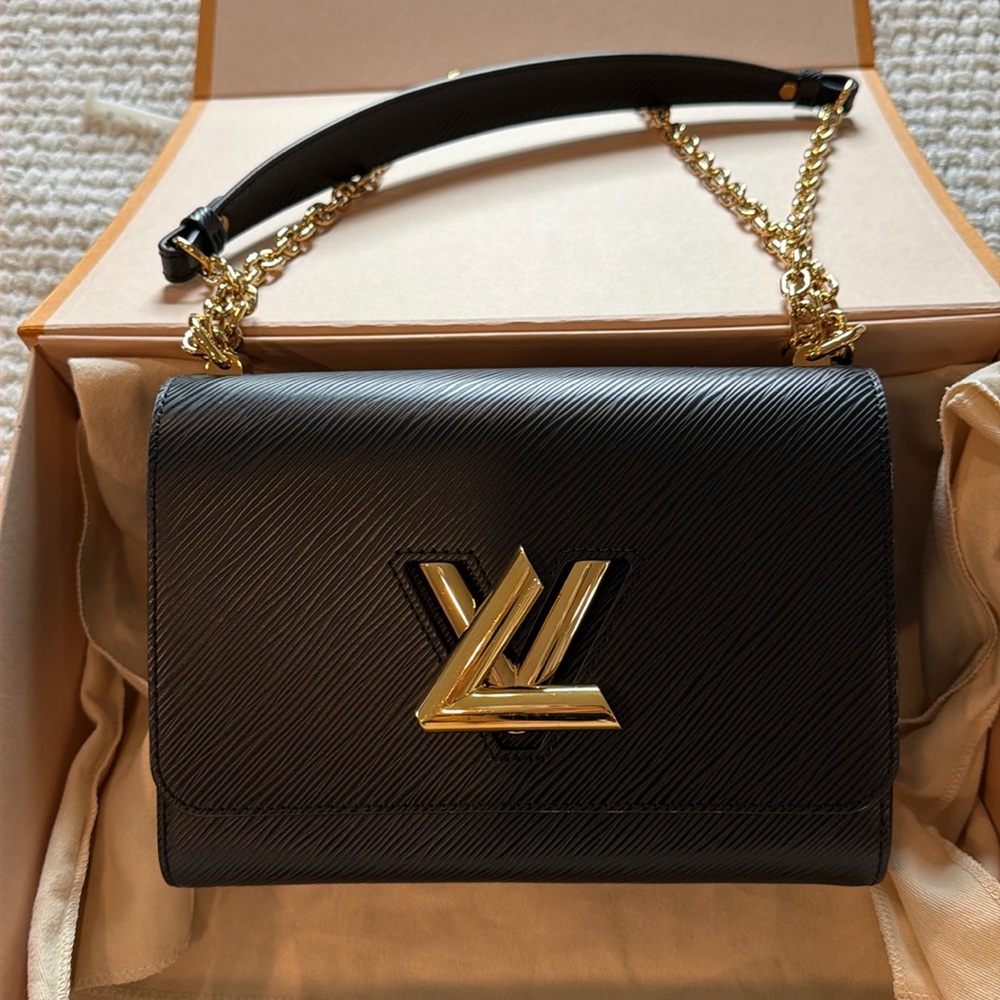 Louis Vuitton Twist MM in Epi leather currently retails for approximately: